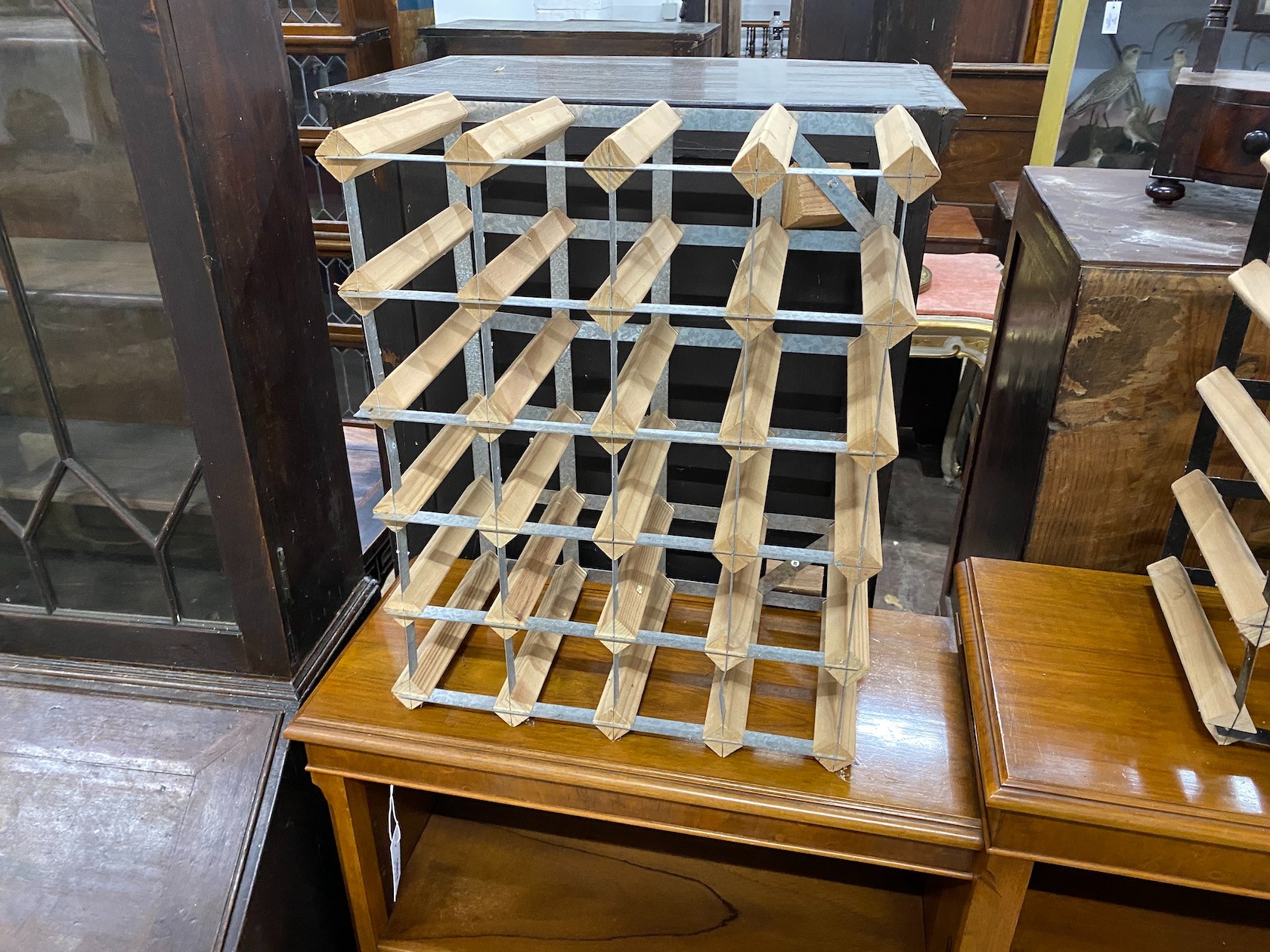 Three modern wine racks, largest 36 bottle capacity, height 60cm